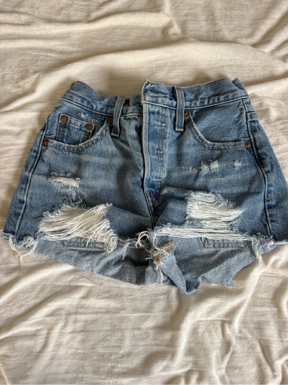 Levi's Distressed Light Blue Denim Cutoff Shorts
